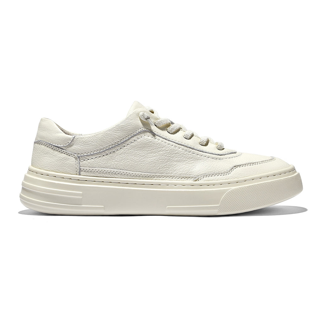Slip-on leather trainers in off-white, featuring grain leather upper, soft pigskin lining, and clean stitched details.