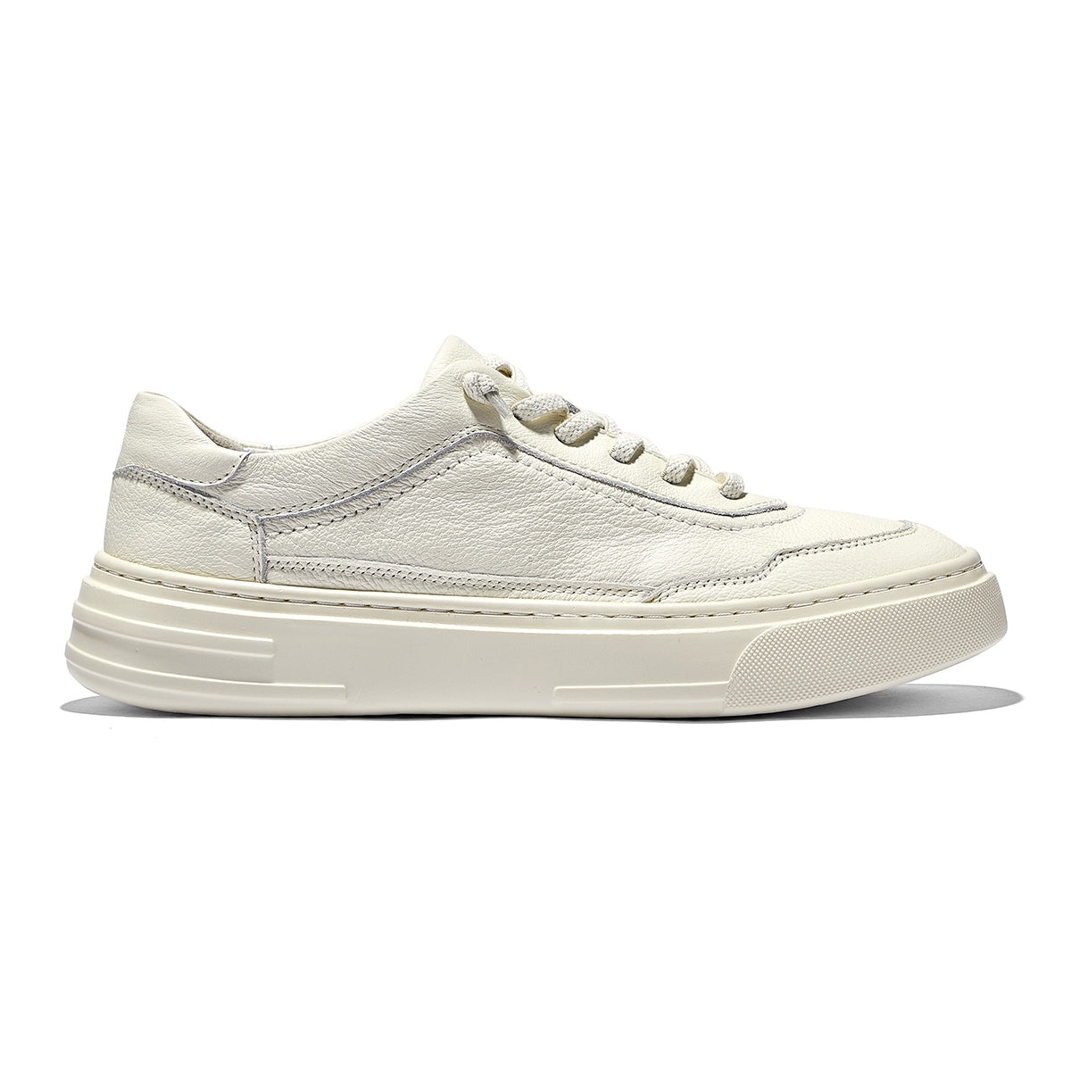 Slip-on leather trainers in off-white, featuring grain leather upper, soft pigskin lining, and clean stitched details.